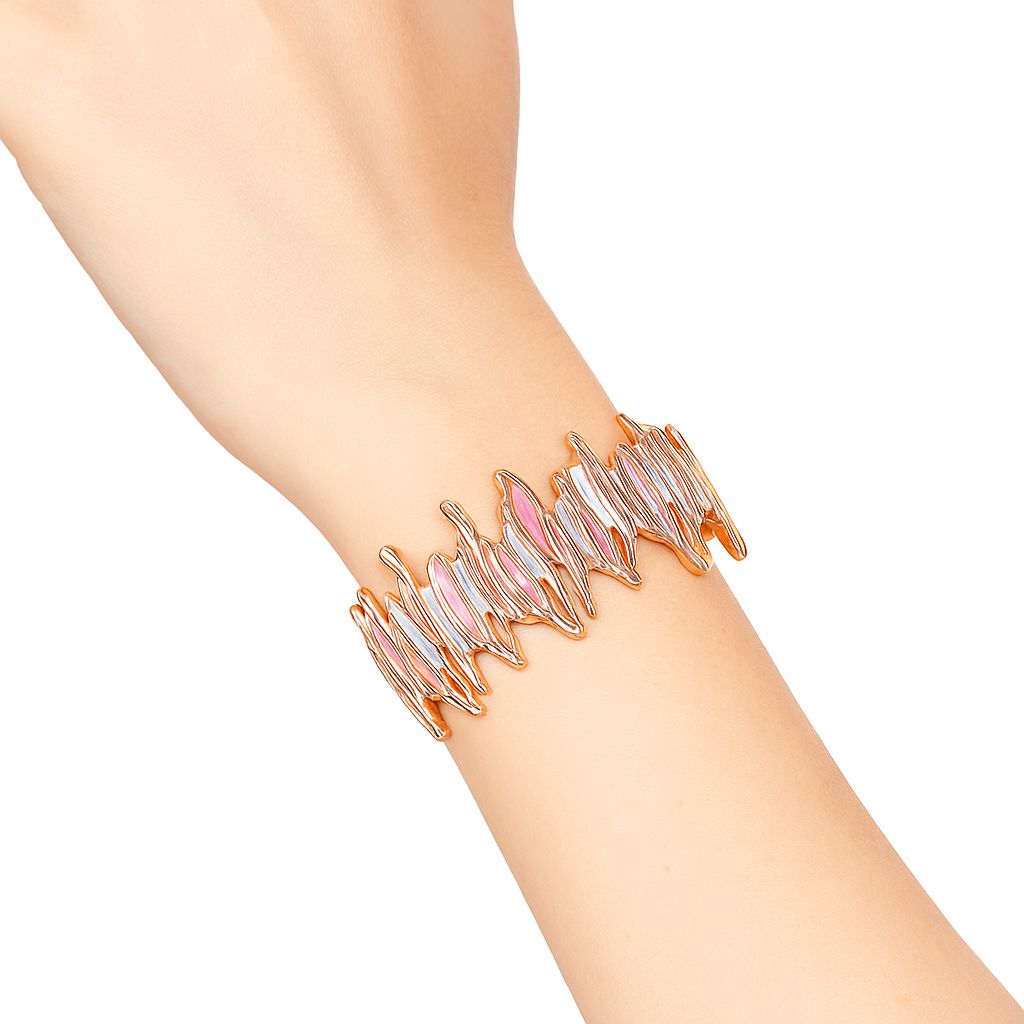 Close-up of artistic molten gold inspired drop earrings