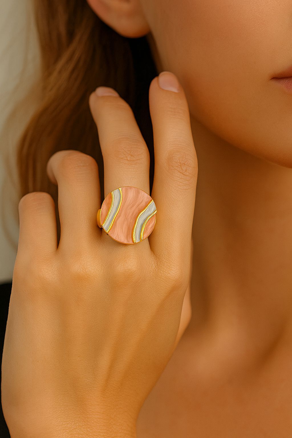 Model wearing artistic KC gold plated enamel ring