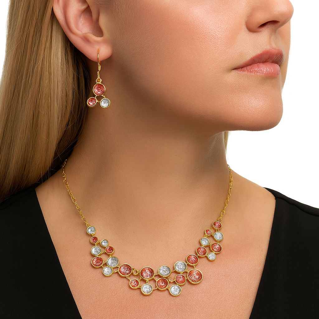 Close-up of hand-painted textured oval pendant with gold finish