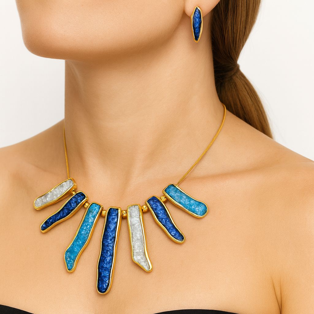 Close-up of hand-painted enamel earrings with KC gold plating