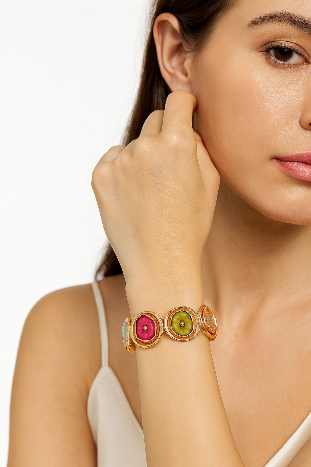 Model wearing green butterfly enamel bracelet – lifestyle view