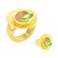 Hand-painted gold statement ring with green crystal