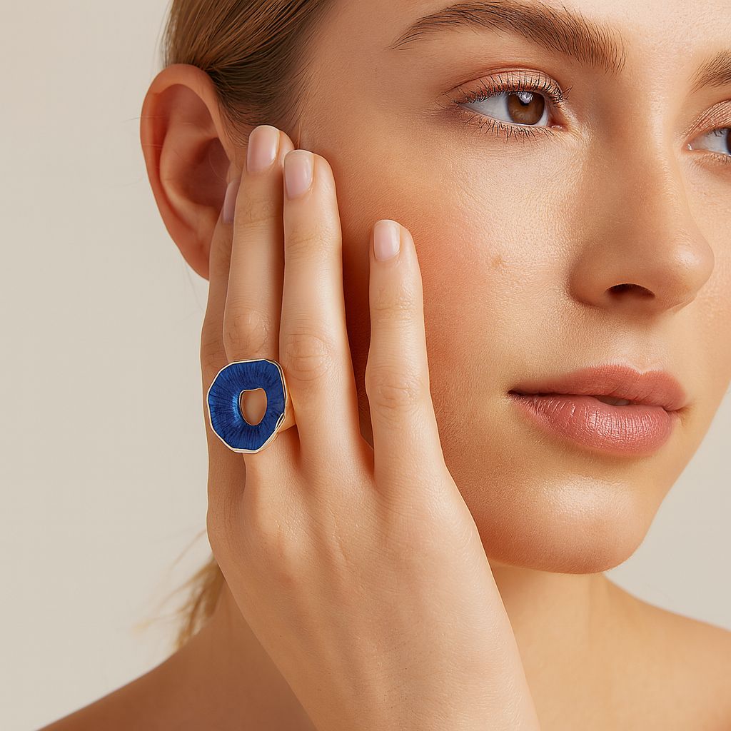 Hand painted blue enamel statement ring worn on hand