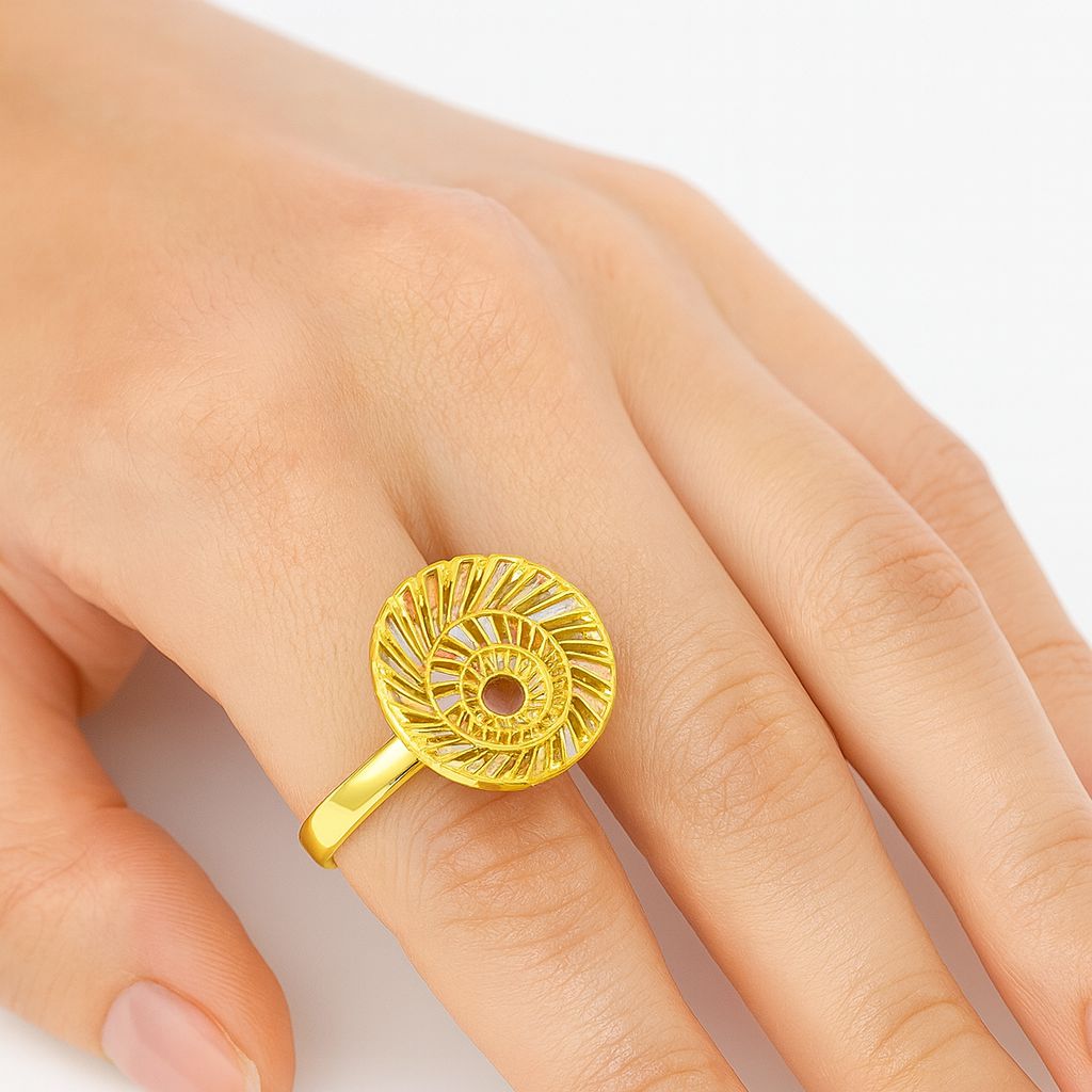 Woman wearing artistic sunburst enamel gold ring