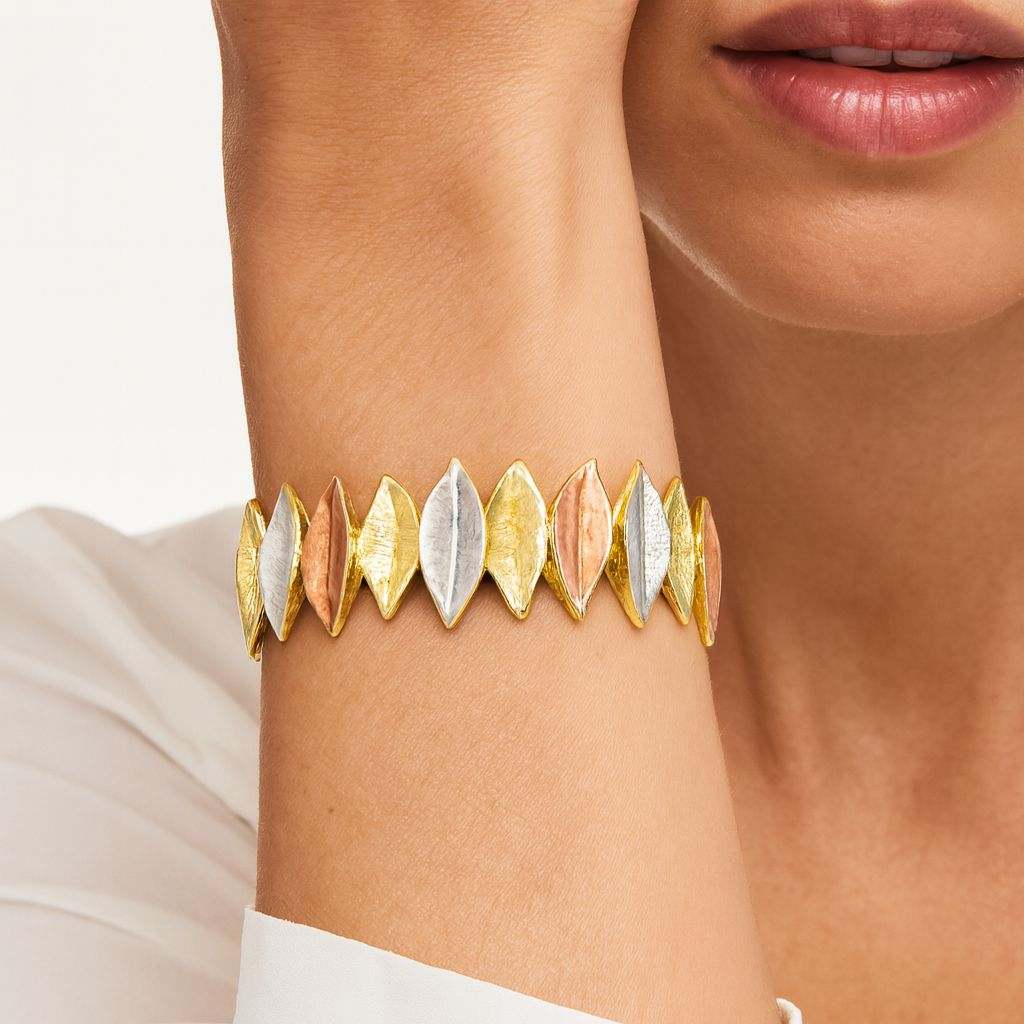 Hand-painted enamel detail on artistic leaf bangle