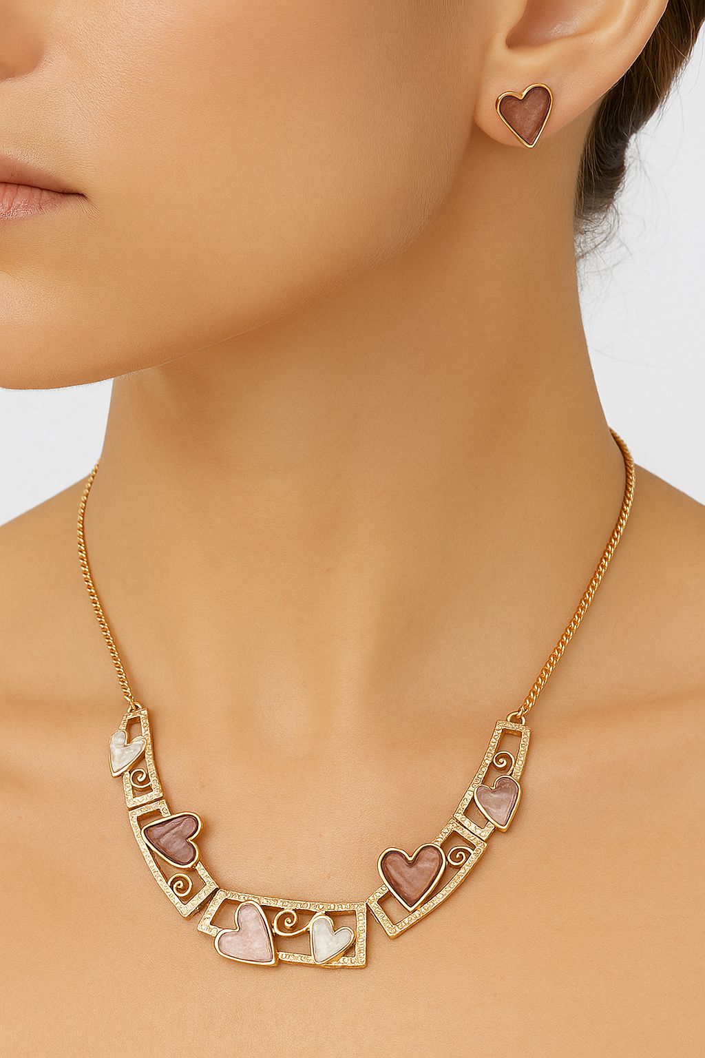 Hand-painted enamel earrings with KC gold plated finish close-up