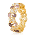 Hand-painted enamel gold bracelet worn on model wrist