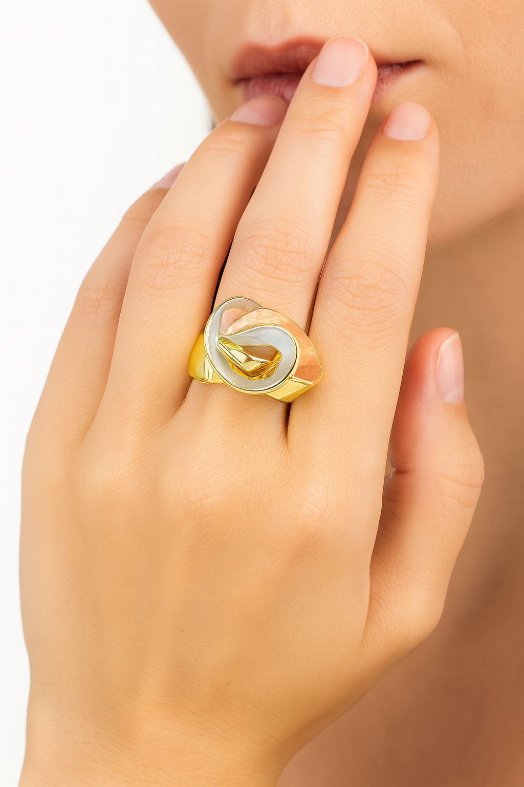 Close-up of enamel swirl ring handcrafted look