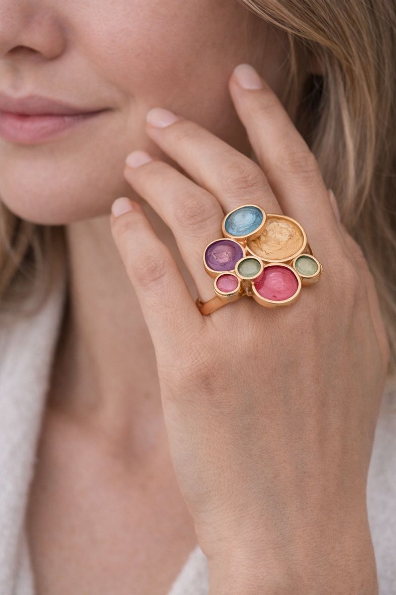 Artistic KC gold plated enamel ring worn on hand