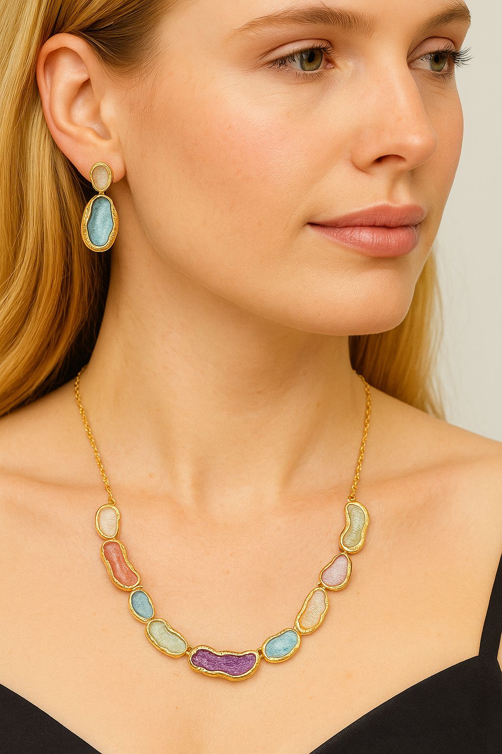 KC gold plated enamel necklace and earrings set worn by model