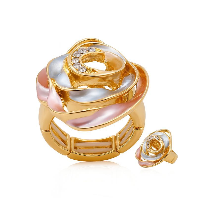 Hand-painted enamel sculptural ring with KC gold plating worn on hand