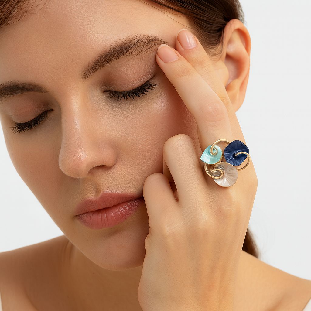 Artistic KC gold plated enamel ring worn on hand