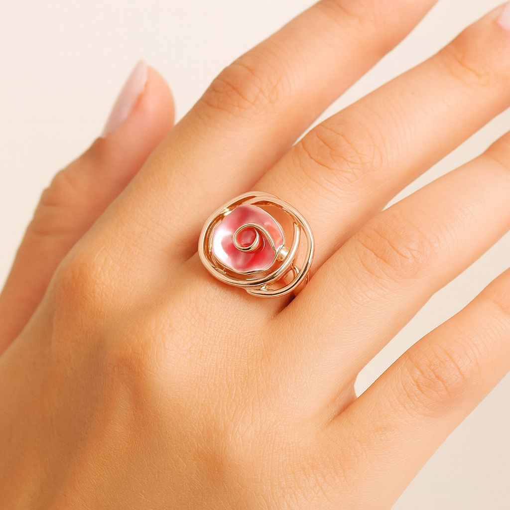 Hand painted enamel ring worn on hand