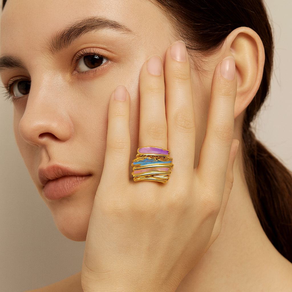 Artistic KC gold plated enamel ring worn on hand