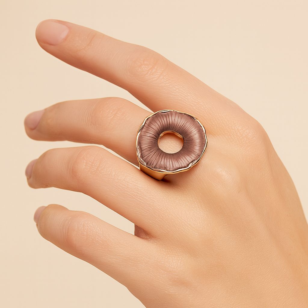 Hand painted enamel ring worn on finger