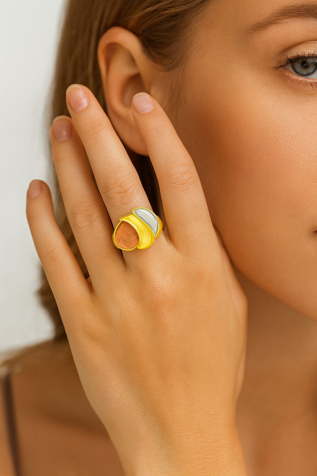 Women’s dual-tone artistic statement ring in orange and silver