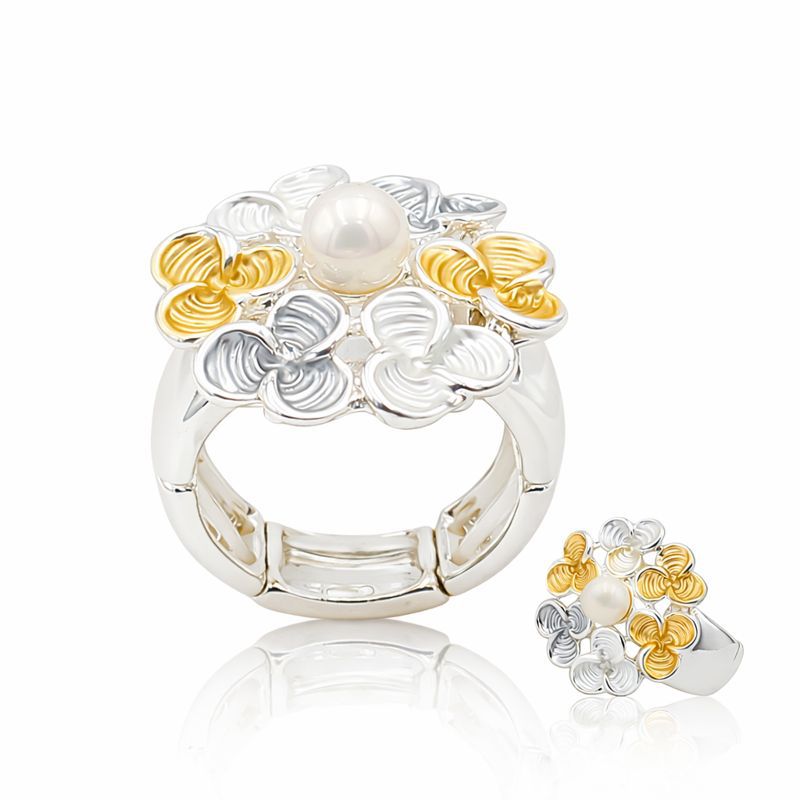 Floral pearl gold and silver ring worn on hand with elegant luxury design