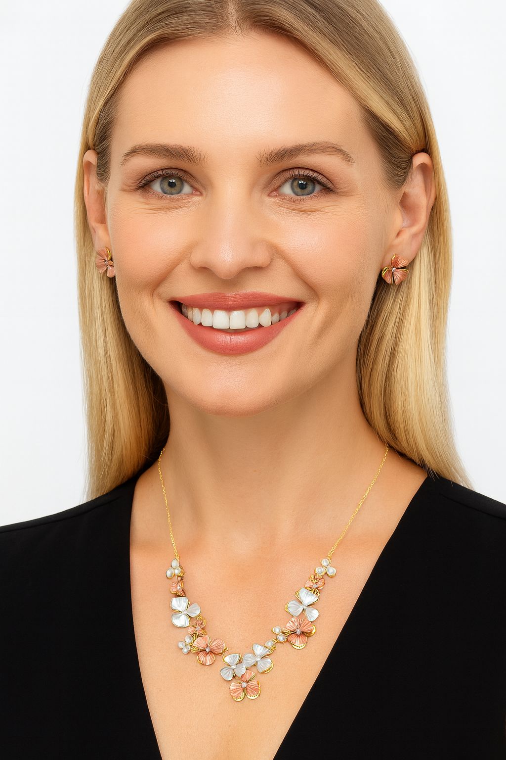 Women wearing pastel enamel flower jewelry set