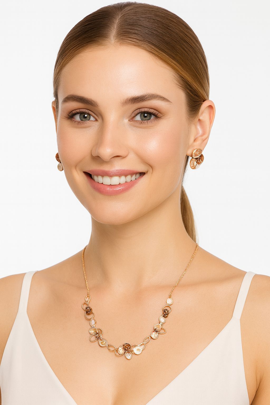 KC gold plated necklace and earrings set with heart motif worn by model