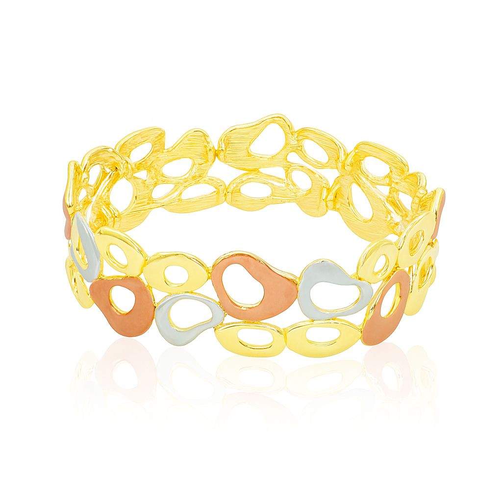 Side view of artistic geometric bangle bracelet with peach, silver, and gold tones
