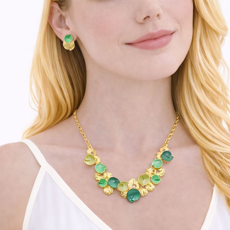 Close up of handcrafted enamel pendant necklace with gold plated alloy