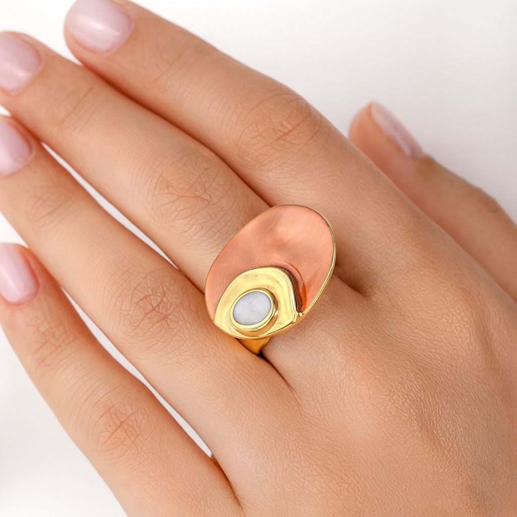 Model wearing abstract enamel ring in KC gold finish