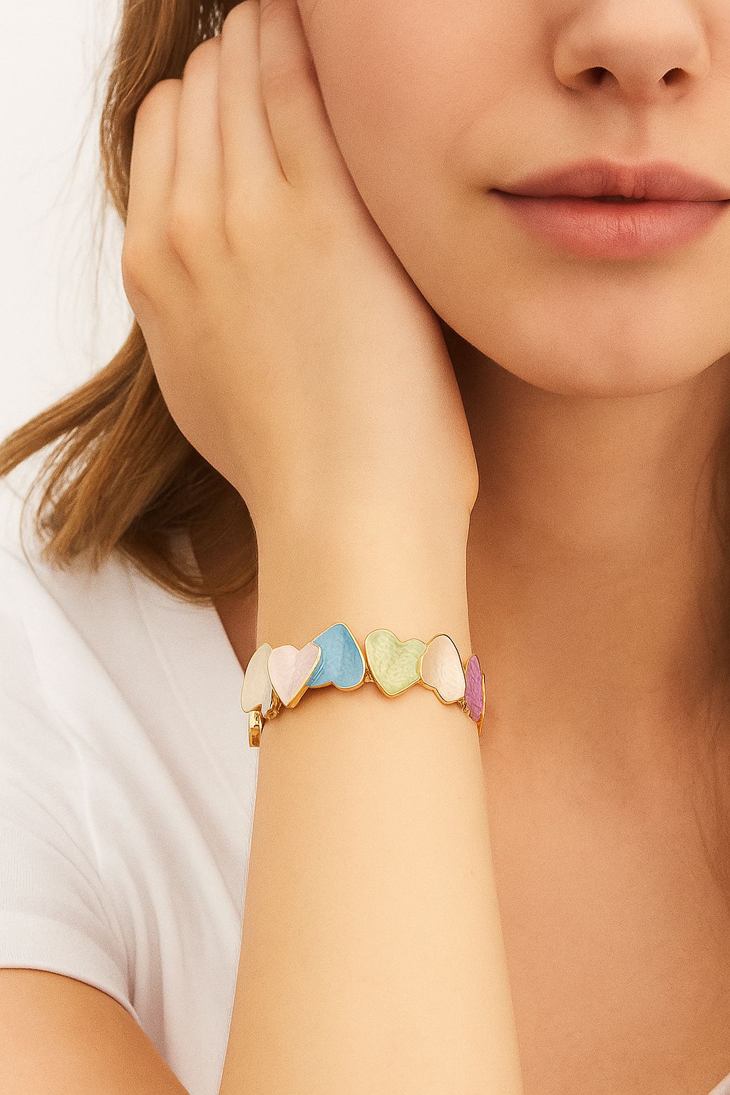 Model wearing romantic heart enamel bracelet