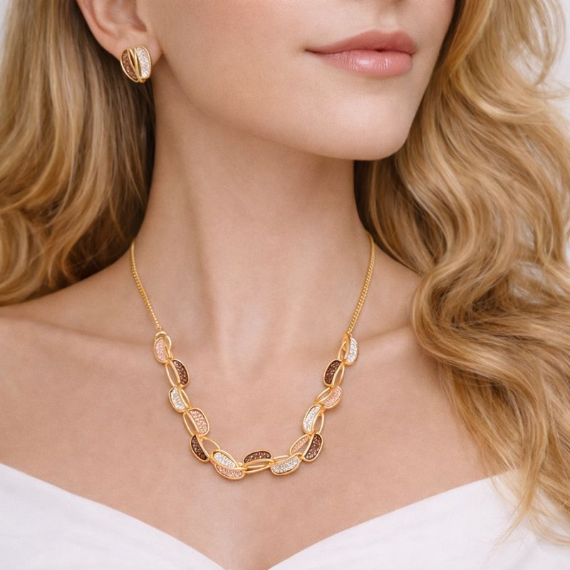 Model wearing hand painted enamel necklace and matching earrings