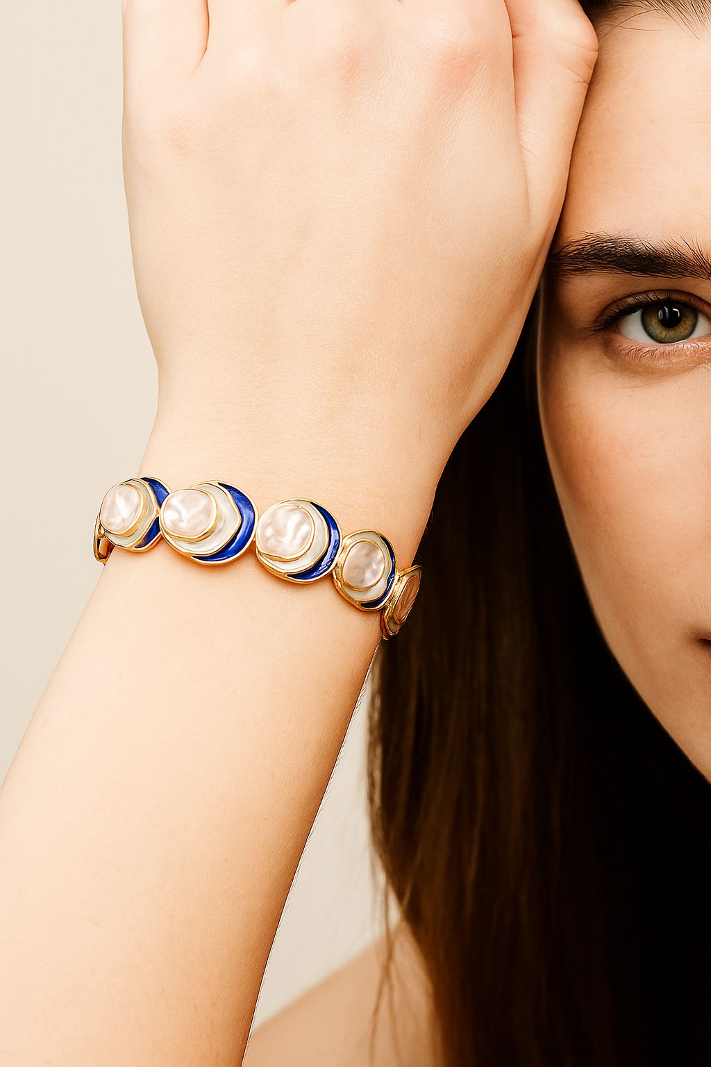 Artistic ocean-inspired enamel bracelet with organic layered shapes