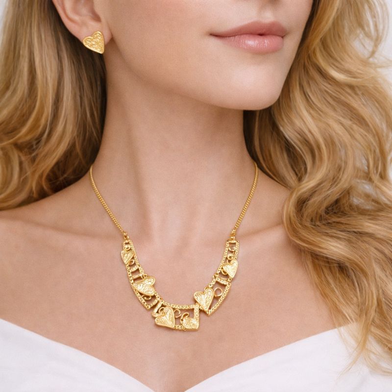 Heart shaped earrings in KC gold plating and enamel