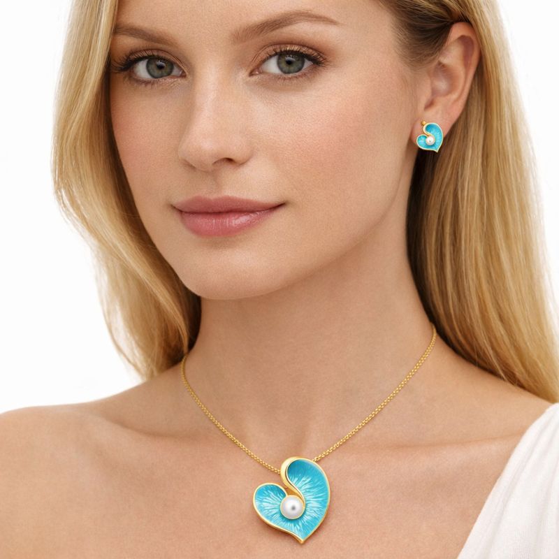 Heart shaped enamel necklace with KC gold plating worn by model