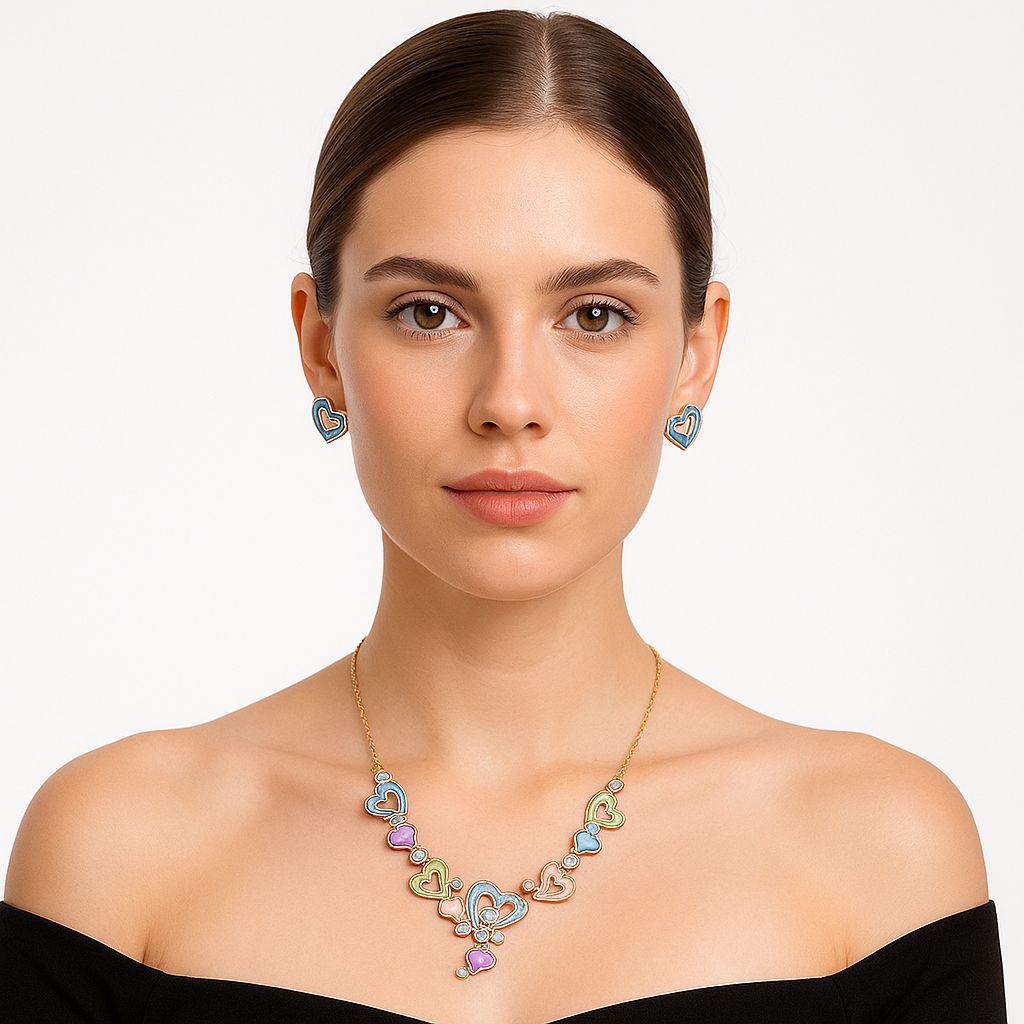 Heart link necklace and earrings worn by model