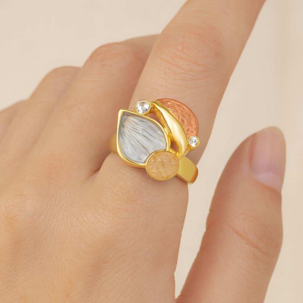 Bold sculptural fashion ring on model’s hand