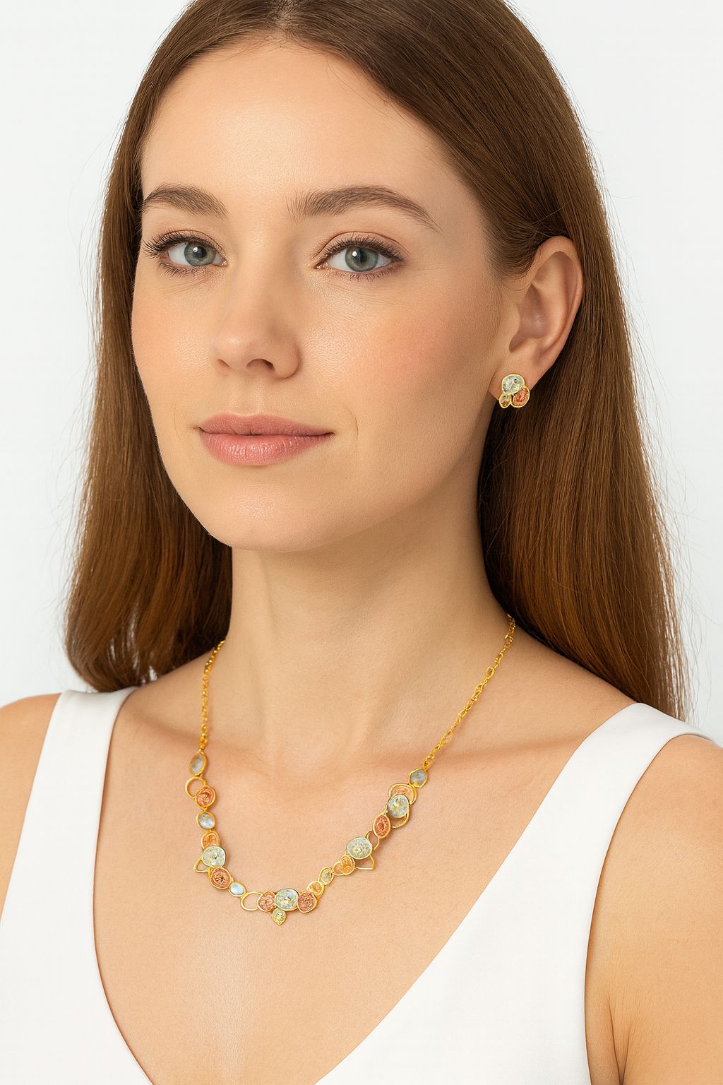 Model wearing artistic alloy necklace with matching earrings