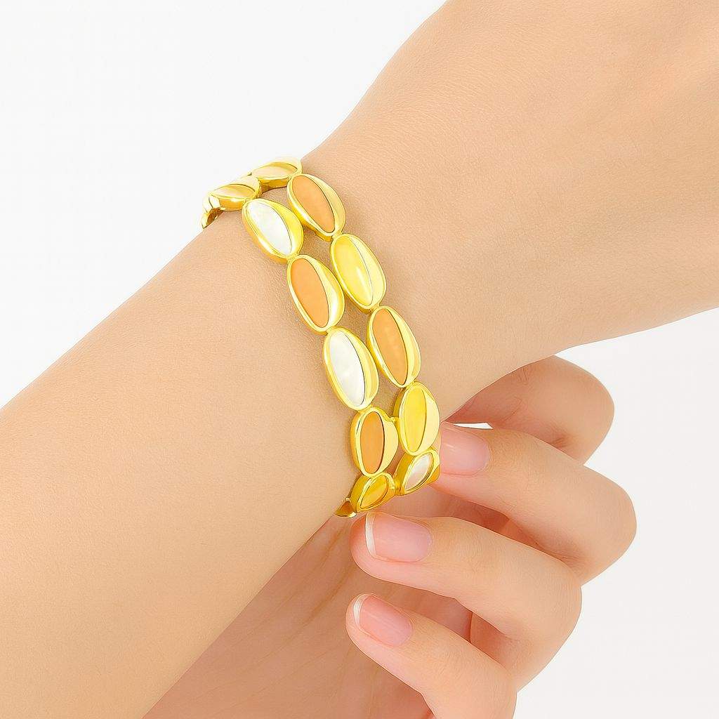 Gold KC-plated multicolor enamel oval bracelet on wrist, lightweight artistic bangle for women