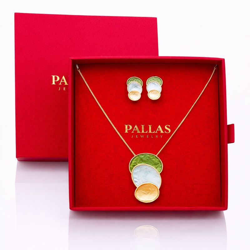 KC gold plated enamel jewelry set displayed in gift box