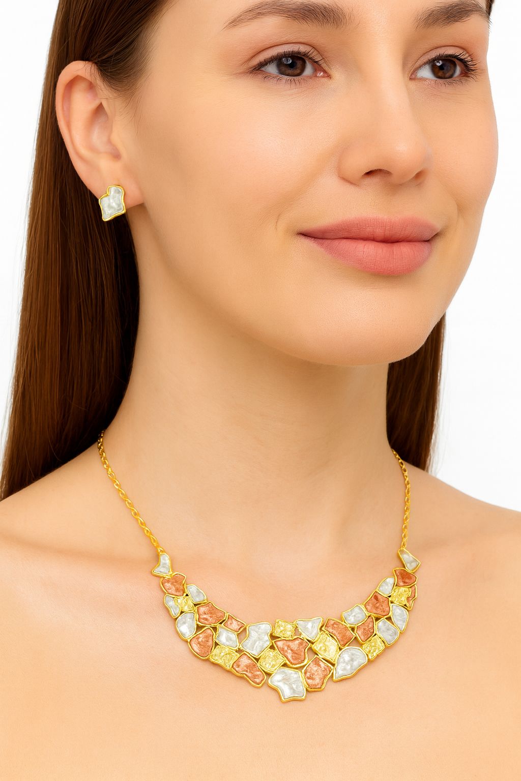 Model wearing irregular enamel gemstone necklace and earrings