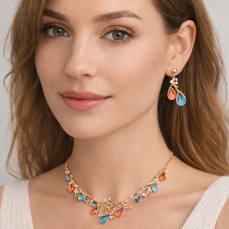 Hand painted enamel leaf details on gold plated necklace