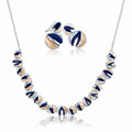 KC gold plated enamel necklace and stud earrings set isolated on white background