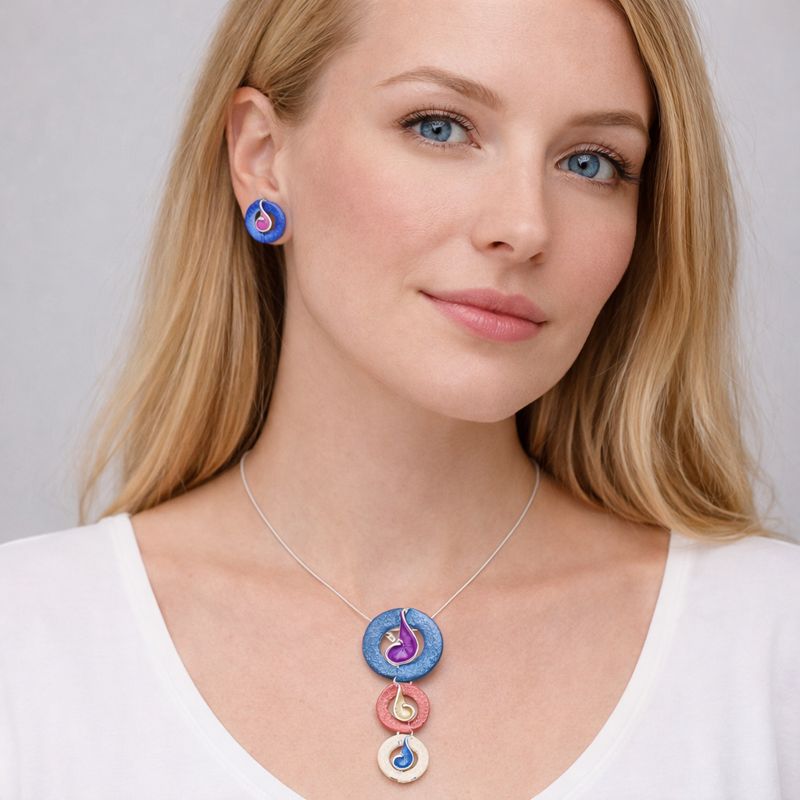 KC gold plated enamel pendant necklace with layered artistic design