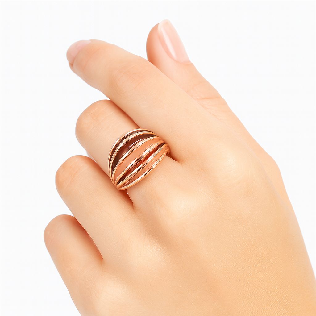 Close-up of hand-painted enamel spiral ring in KC gold finish