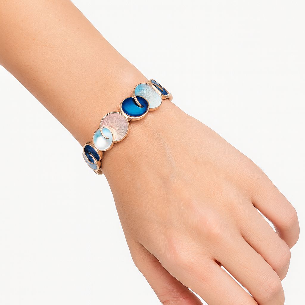Model wearing colorful hand-painted enamel bracelet