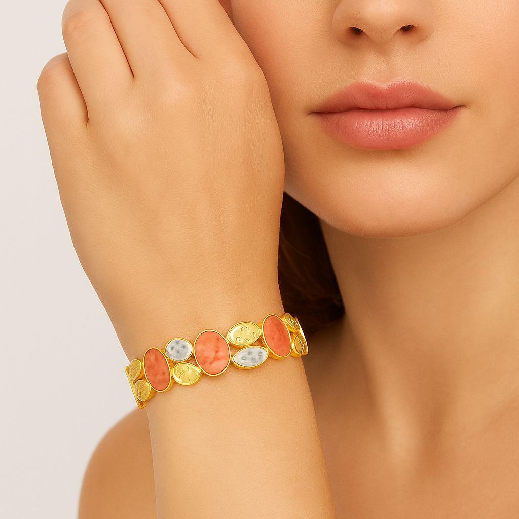 Model wearing hand-painted enamel gold bracelet