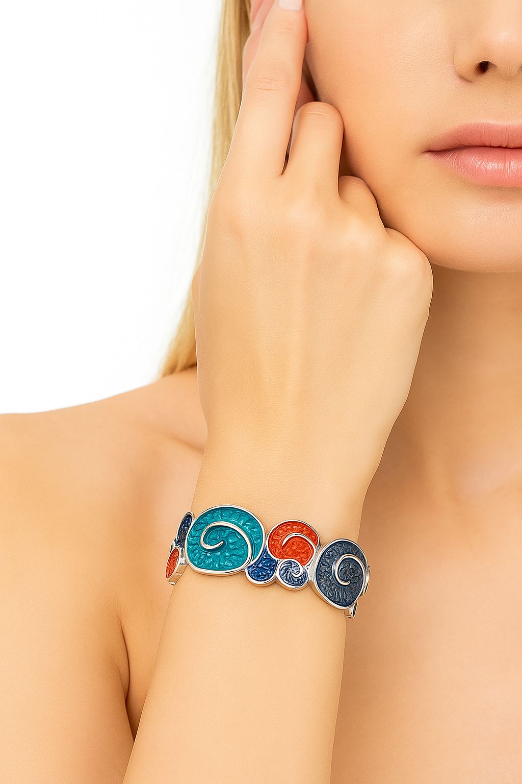 KC gold plated alloy bracelet with artistic swirl enamel design