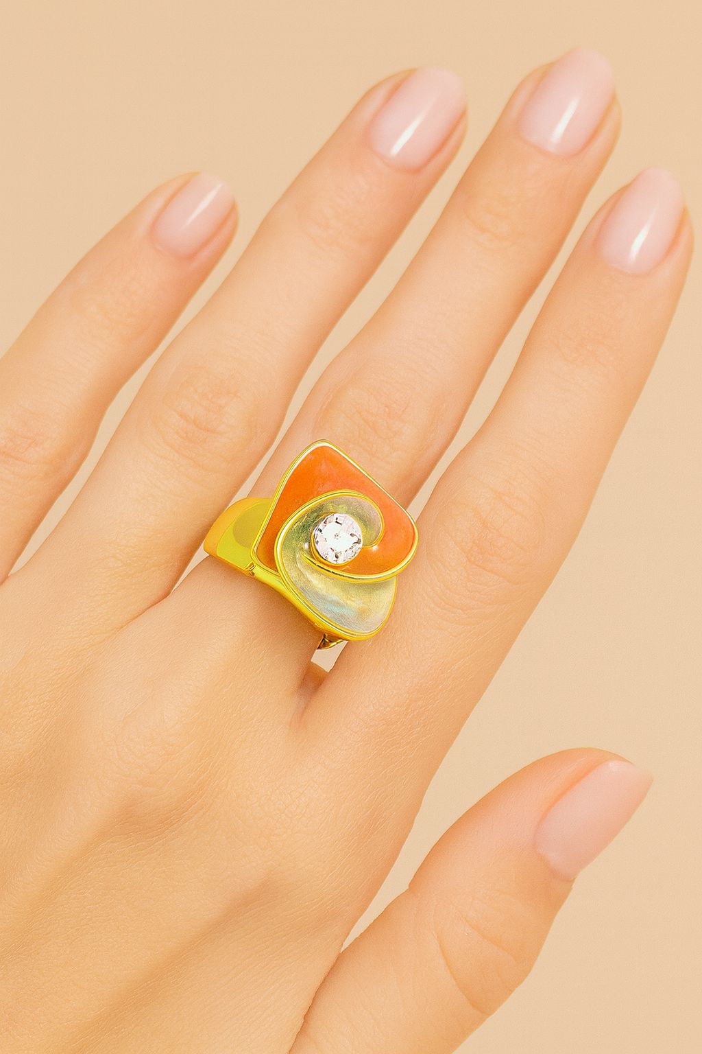 KC gold plated artistic ring featuring sculptural enamel waves