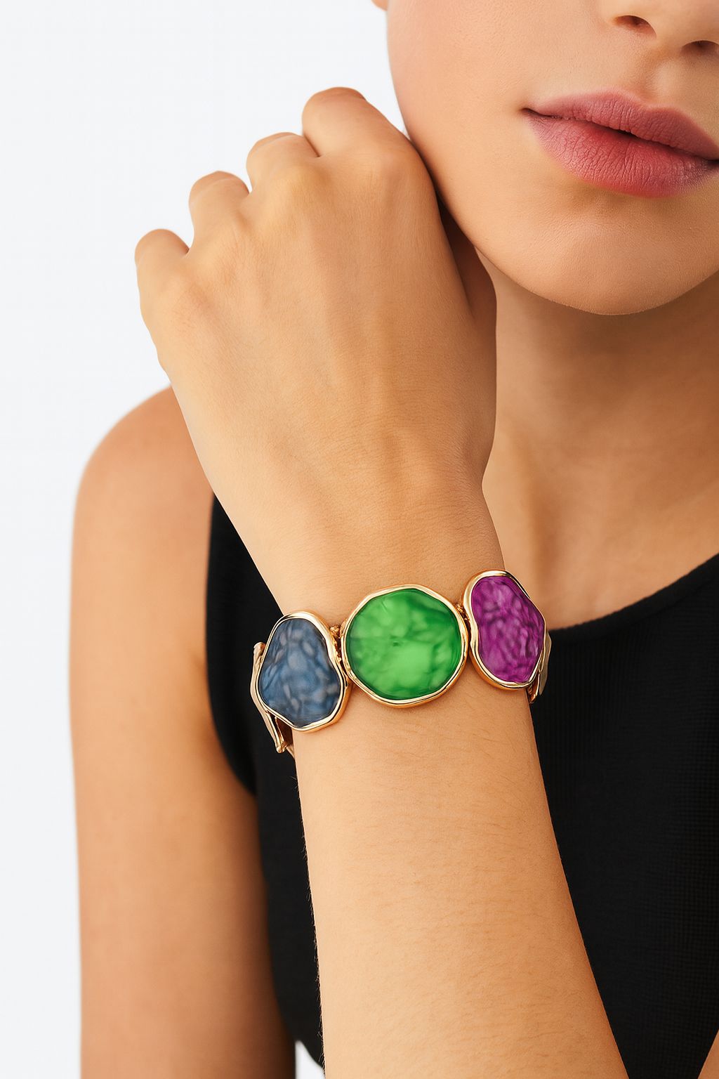 Close-up of colorful enamel statement bracelet