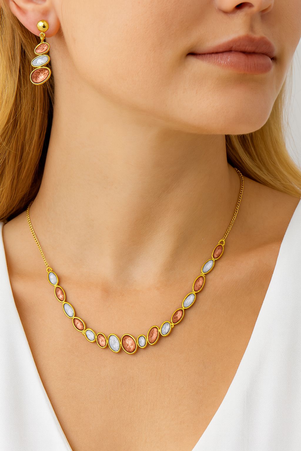 Model wearing gold alloy hand-painted necklace