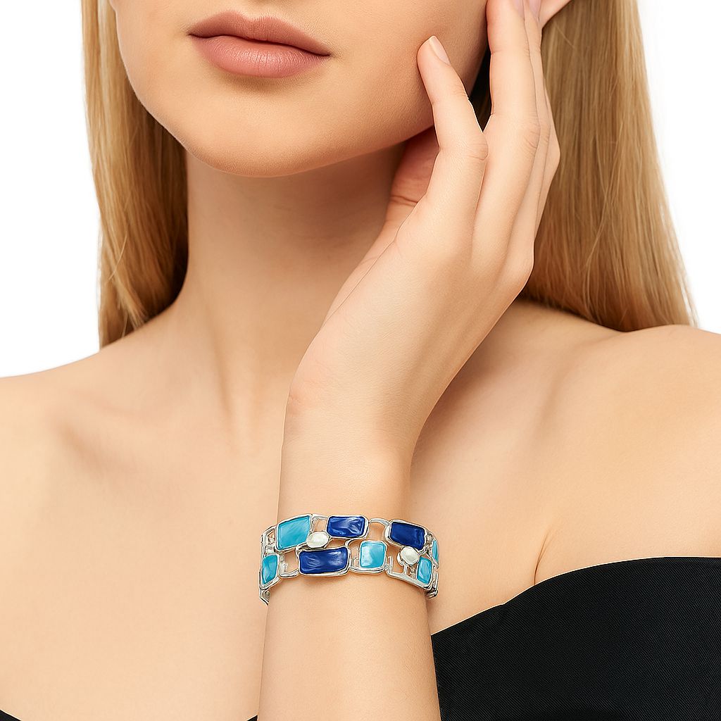 KC gold plated alloy bracelet with hand painted blue enamel