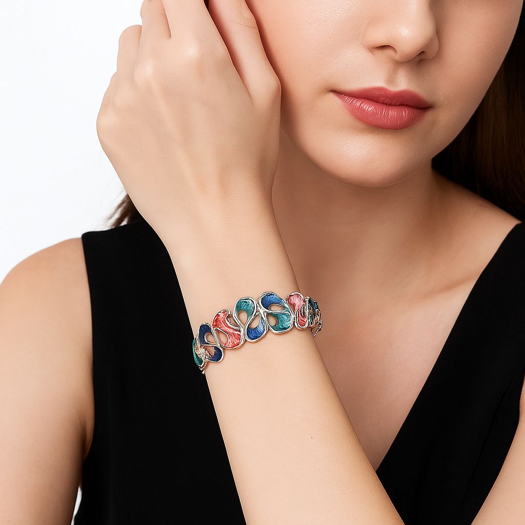 KC gold-plated alloy bracelet with artistic enamel swirls