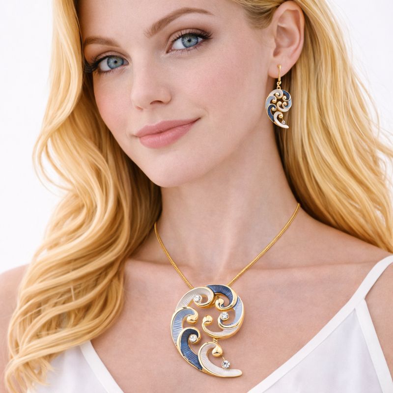 Close-up of hand-painted enamel necklace with sculptural curves